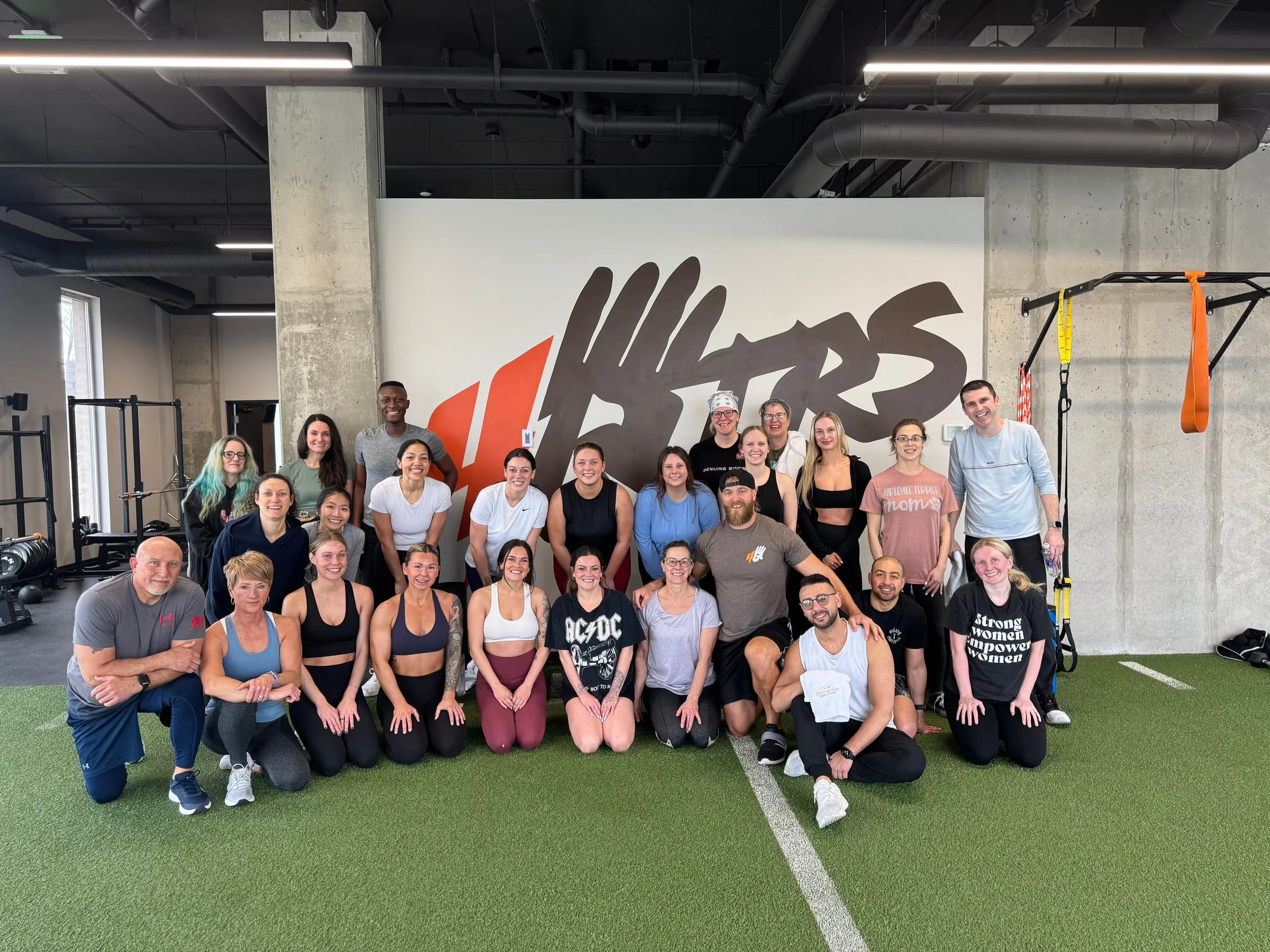 Gather and Ground group gathered in a fitness studio